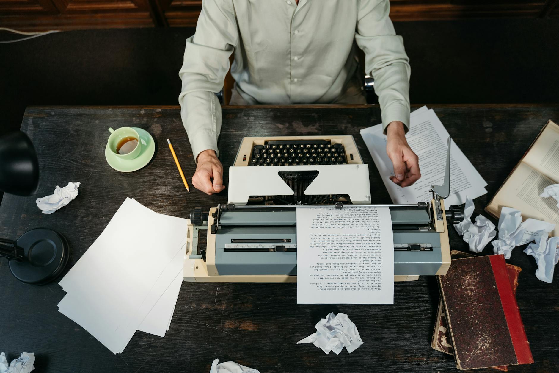 Photo by Tima Miroshnichenko on <a href="https://www.pexels.com/photo/a-person-sitting-at-the-table-9572355/" rel="nofollow">Pexels.com</a>
